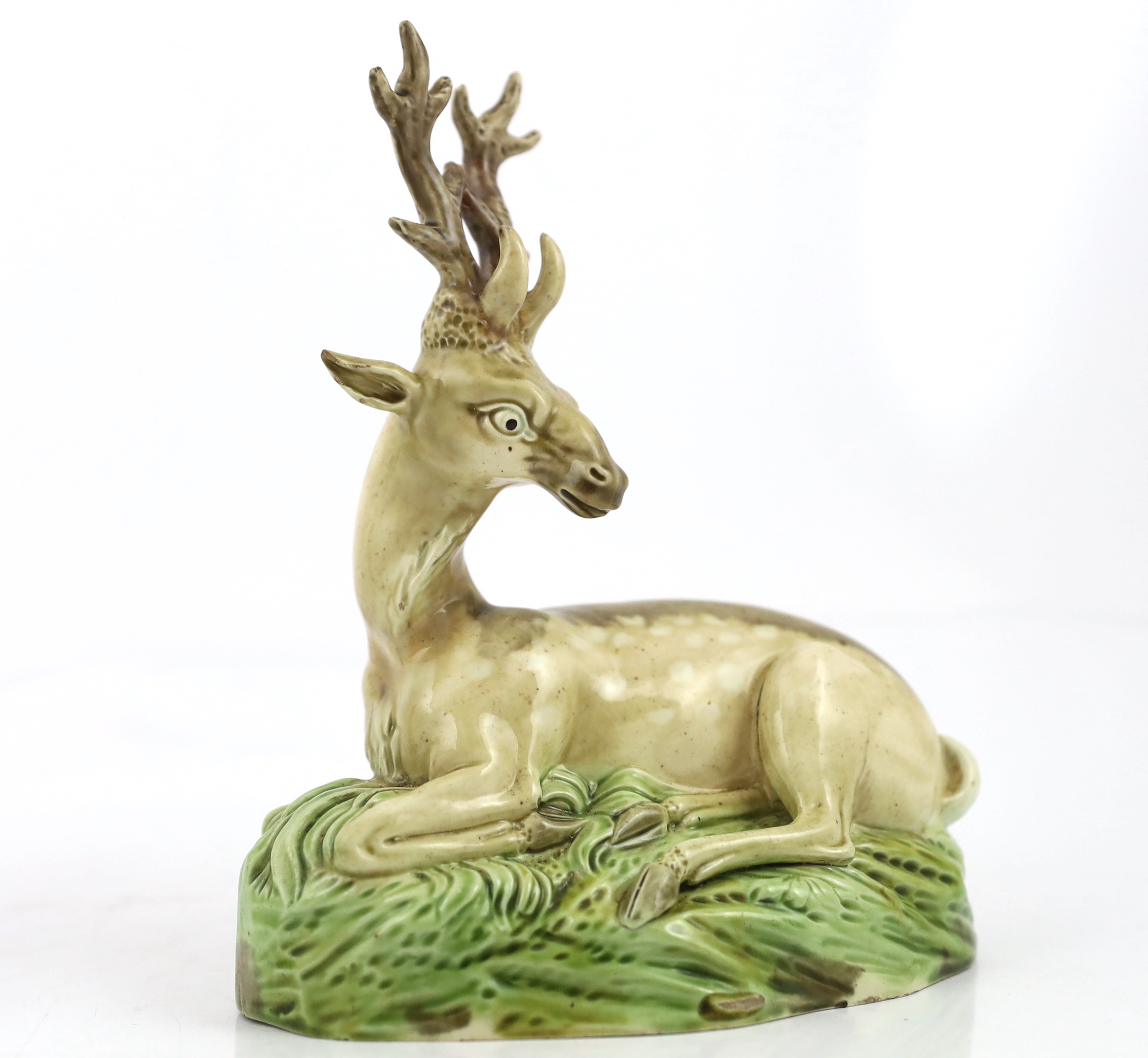 A near pair of Ralph Wood type figures of a Stag and Hind, c.1790, some restoration